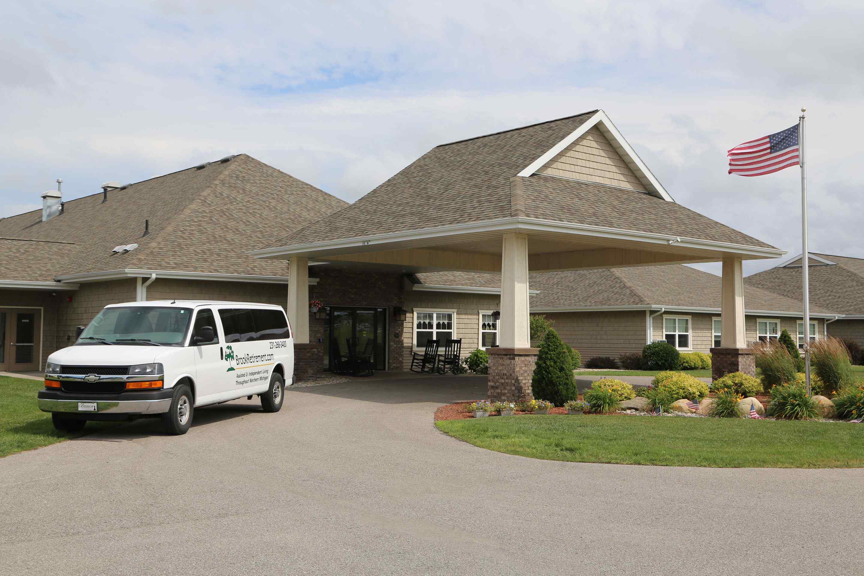 The Brook of Gaylord main entrance with transportation van