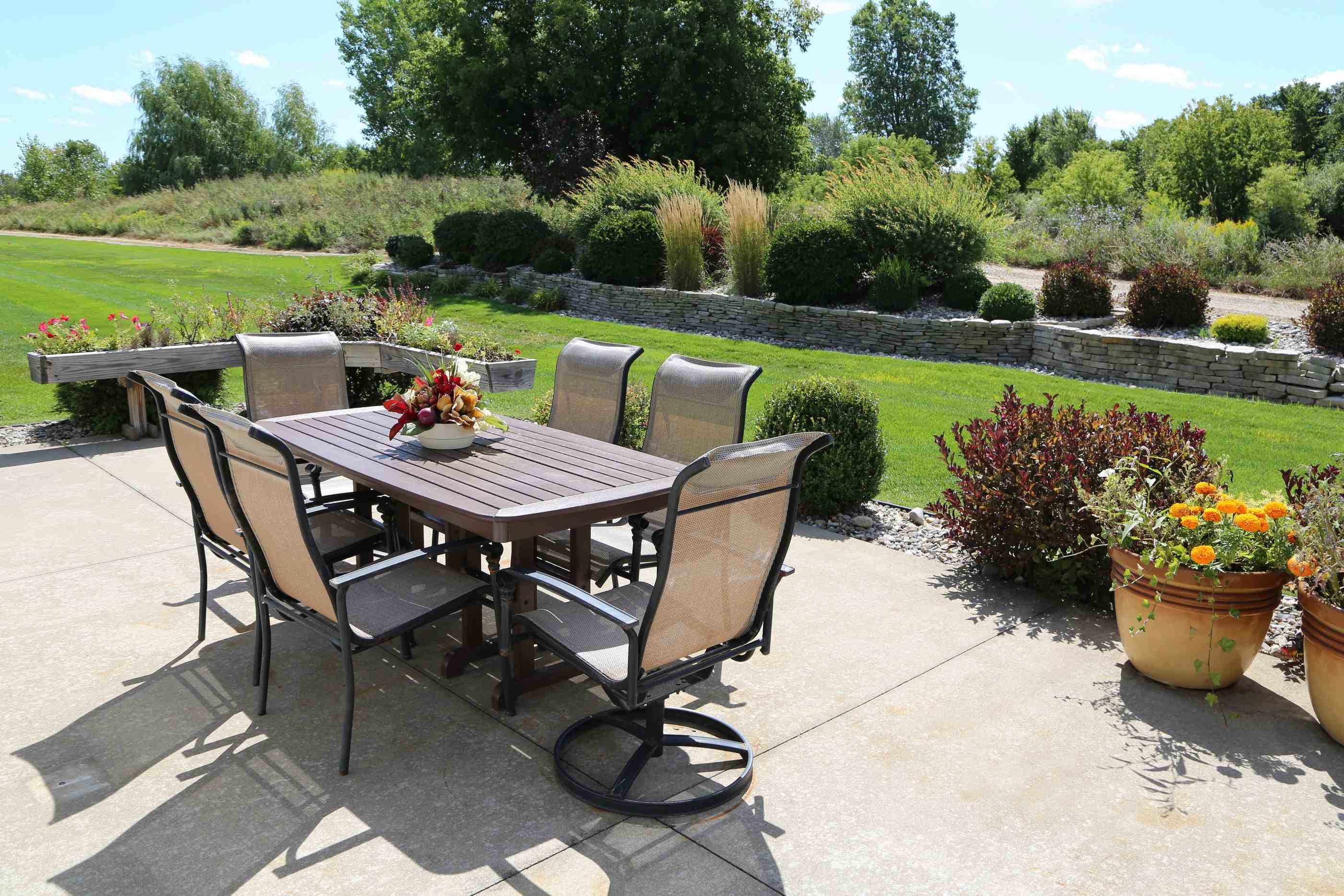 The Brook of Gladwin outdoor sitting area with view of landscaping