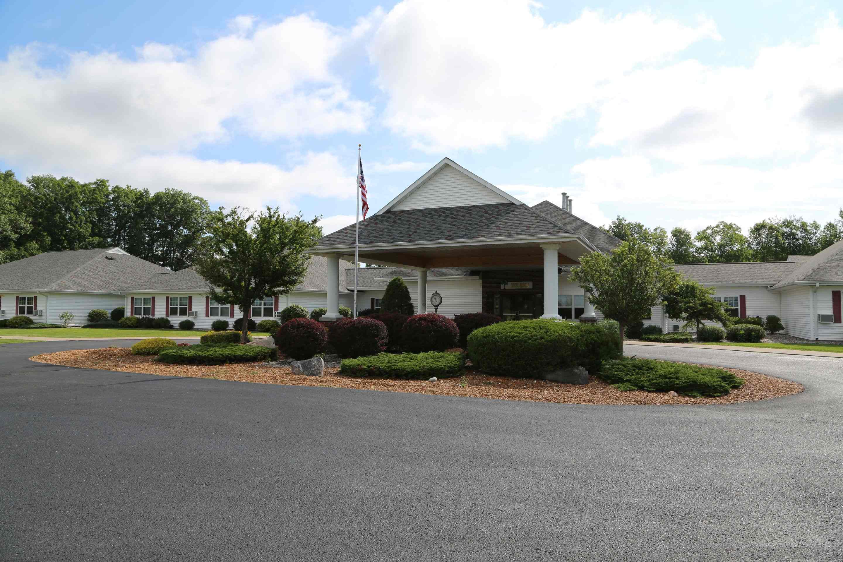 The Brook of Houghton Lake main entrance with landscaping