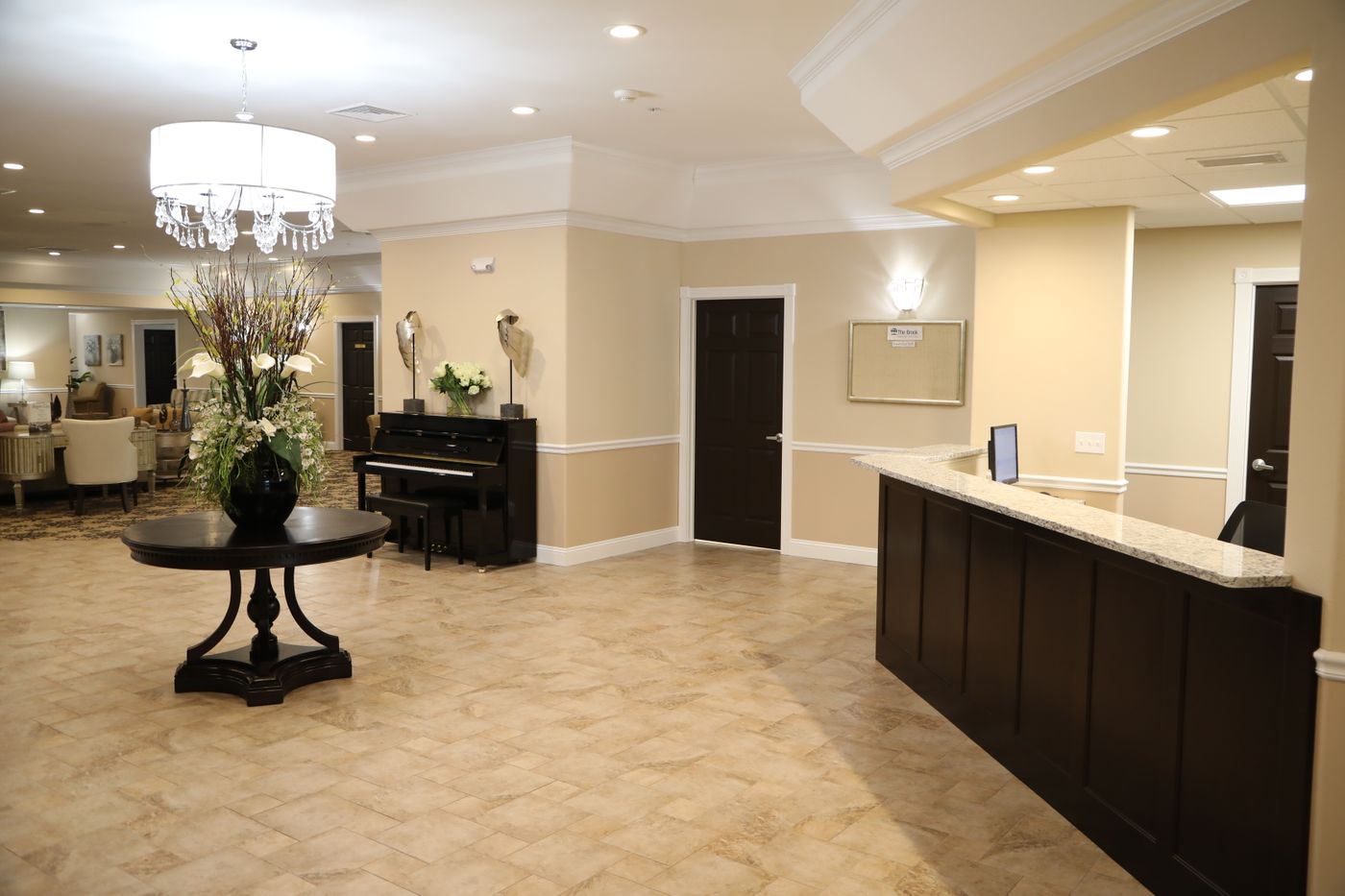 The Brook of Rogers City foyer with piano